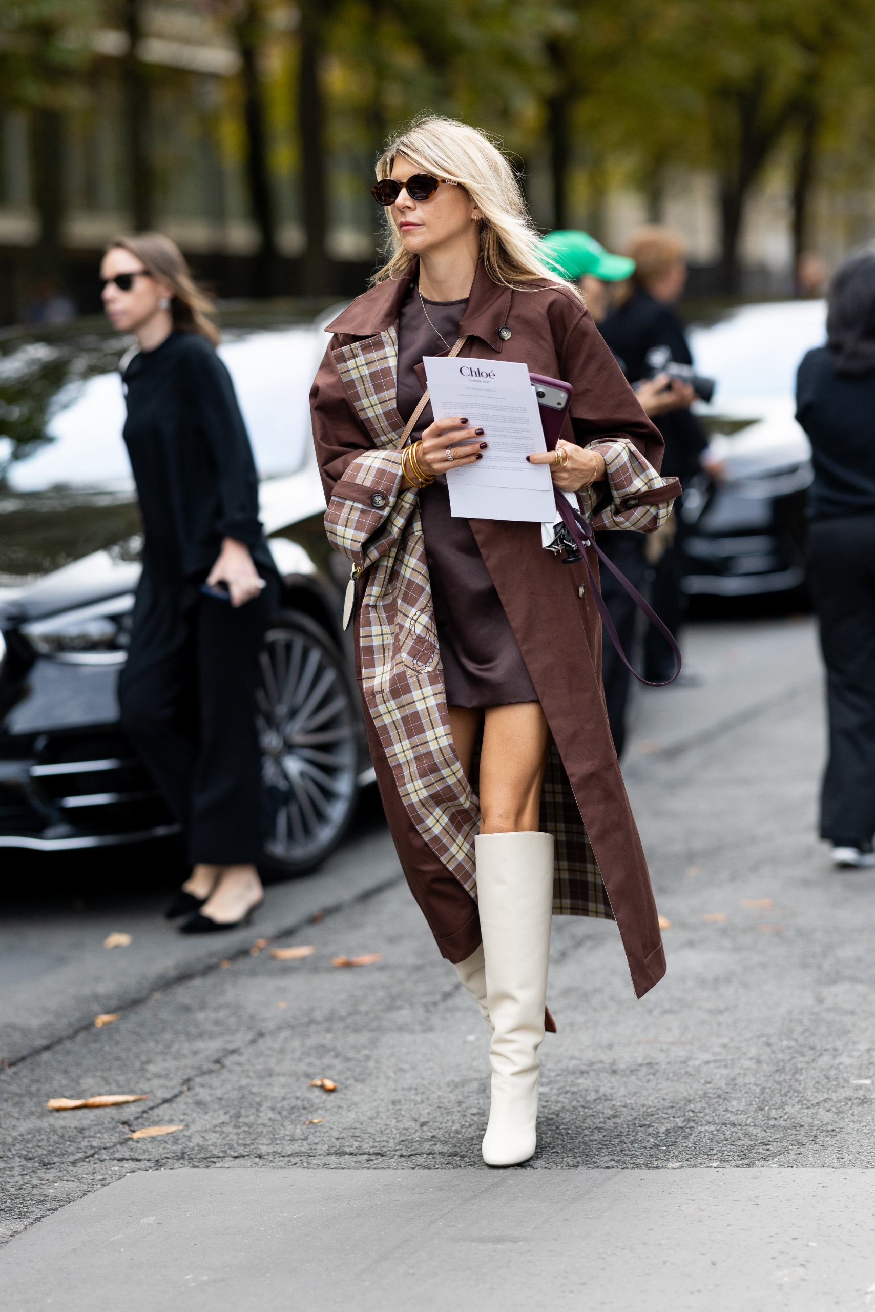 French girls wearing trench coats for fall at Paris Fashion Week