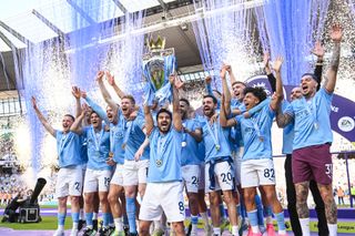 Manchester City captain Ilkay Gundogan lifts the Premier League trophy after the Premier League match between Manchester City and Chelsea FC at Etihad Stadium on May 21, 2023 in Manchester, England.