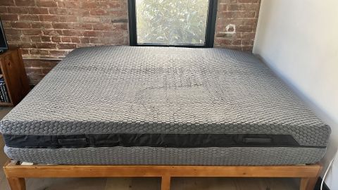 The Layla Hybrid Mattress on a bed by a window