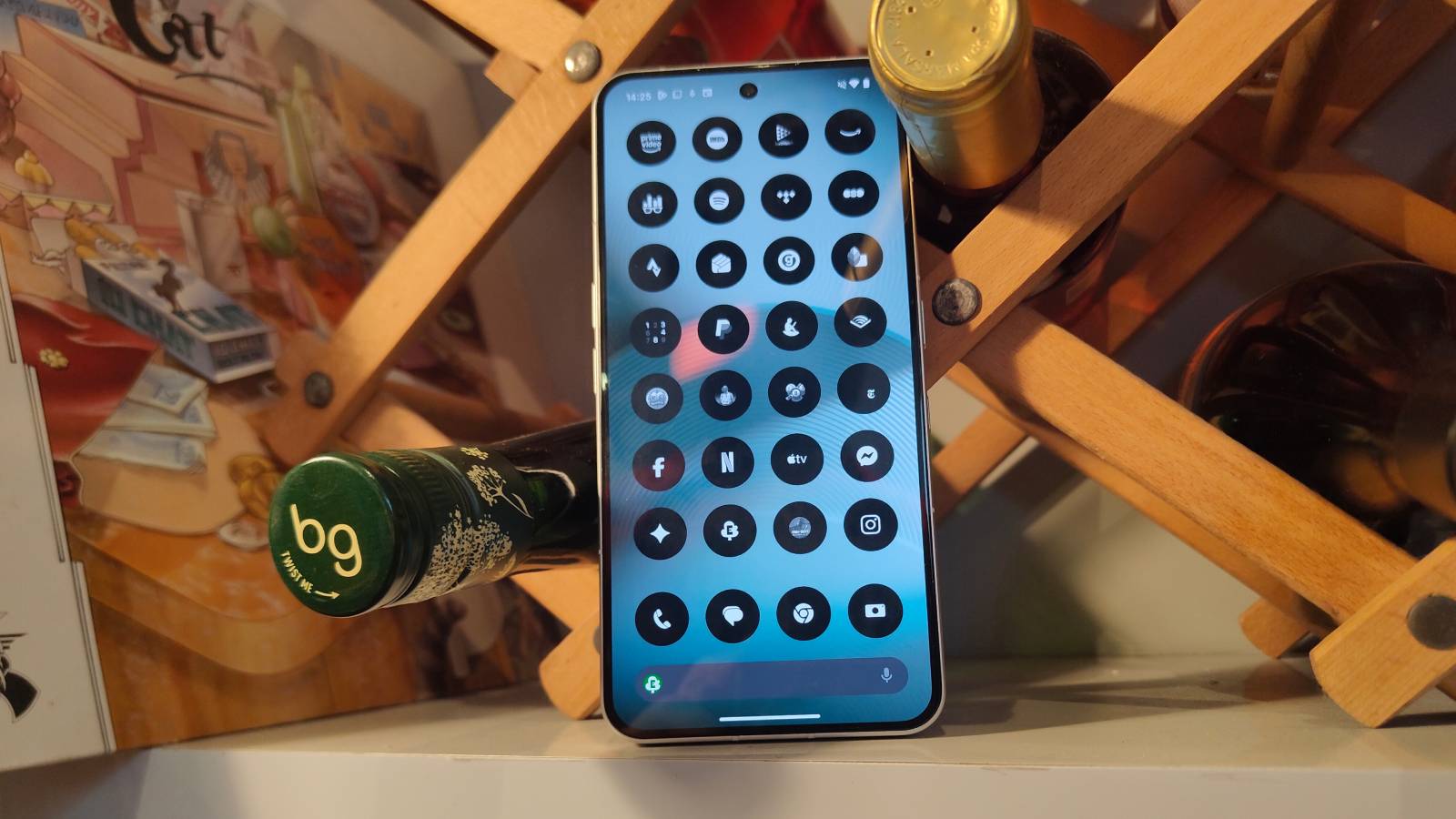 The Nothing Phone 3 leaning on a wine rack.