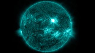 view of the sun showing a bright eruption near the center, this is the x-class flare erupting on June 30.