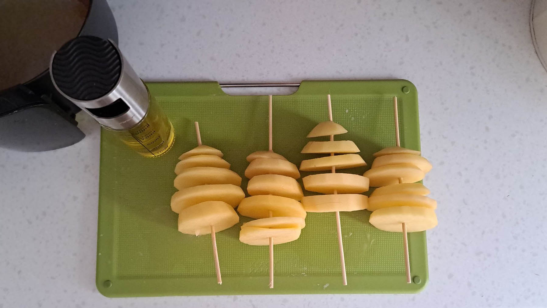 Raw potato trees on a skewer