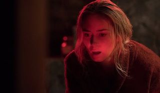 A Quiet Place Emily Blunt Evelyn worried bathed in red light