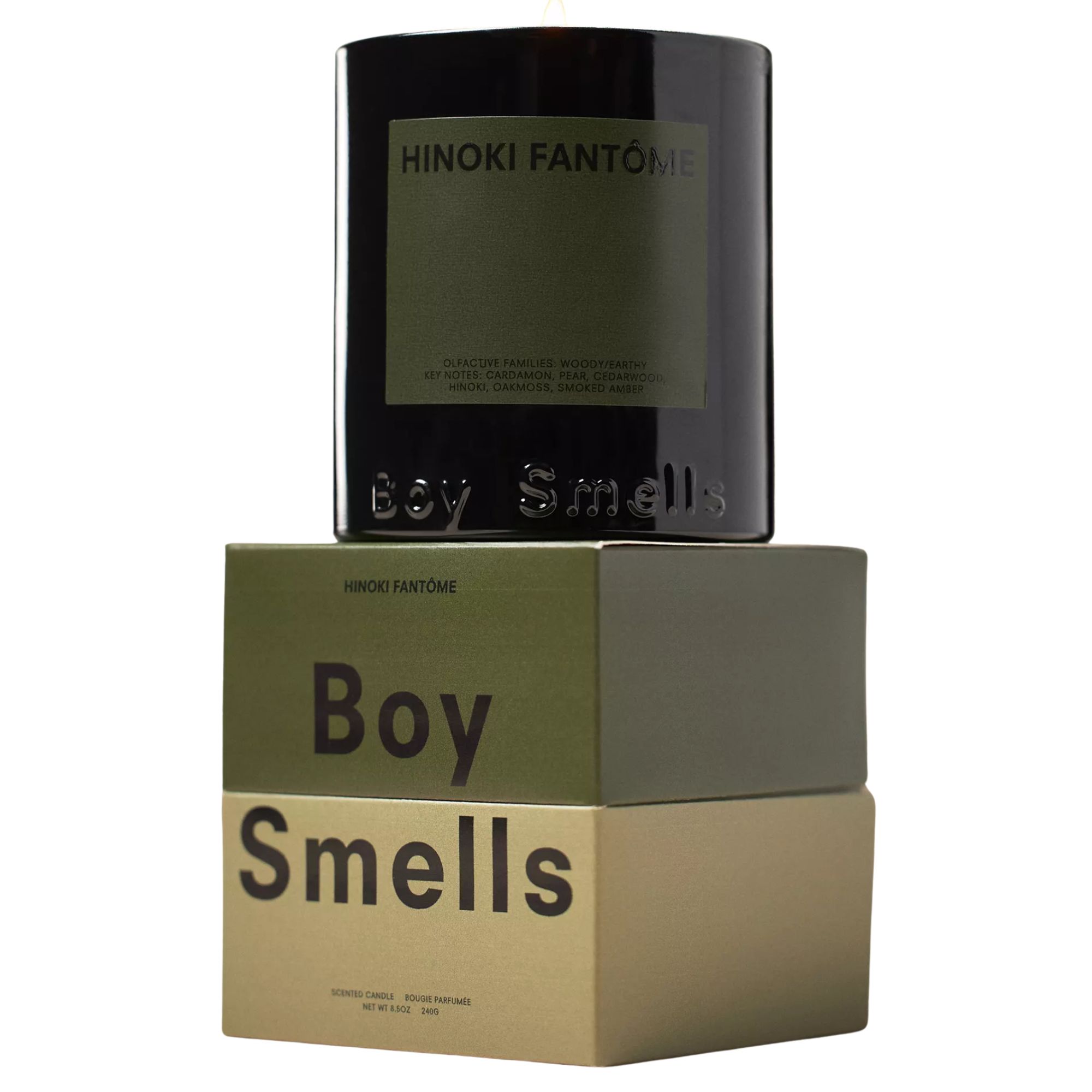 Boy smells Hinoki candle