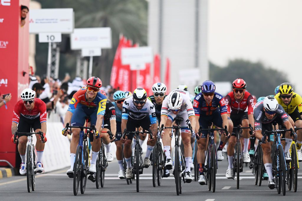 QIDFA UNITED ARAB EMIRATES FEBRUARY 20 LR Dylan Groenewegen of The Netherlands and Team Jayco AlUla Jonathan Milan of Italy and Team LidlTrek Fernando Gaviria Rendon of Colombia and Team Movistar Team Tim Merlier of Belgium and Team Soudal QuickStep Fabio Jakobsen of The Netherlands and Team Picnic PostNL and Jasper Philipsen of Belgium and Team AlpecinDeceuninck cross the finish line during the 7th UAE Tour 2025 Stage 4 a 181km stage from Fujairah Qidfa Beach to Umm al Quwain UCIWWT on February 20 2025 in Fujairah Qidfa Beach United Arab Emirates Photo by Dario BelingheriGetty Images