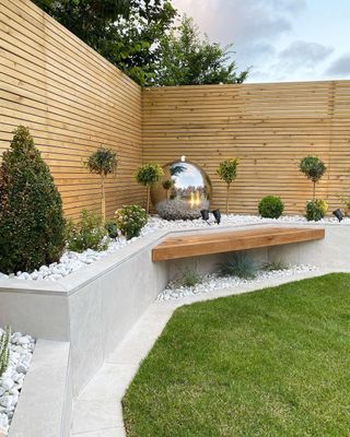 a garden paving idea where the paving is used for raised beds