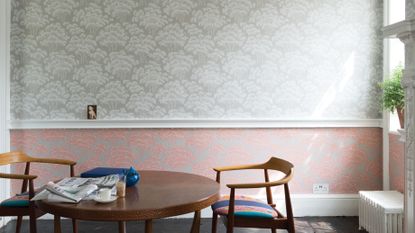 dining room with mixed pattern wallpaper from farrow and ball