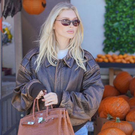 Elsa Hosk wears a leather bomber jacket