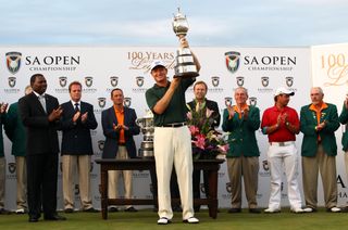 Ernie Els holds the South African Open trophy in 2010