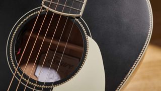 Close up of PRS acoustic