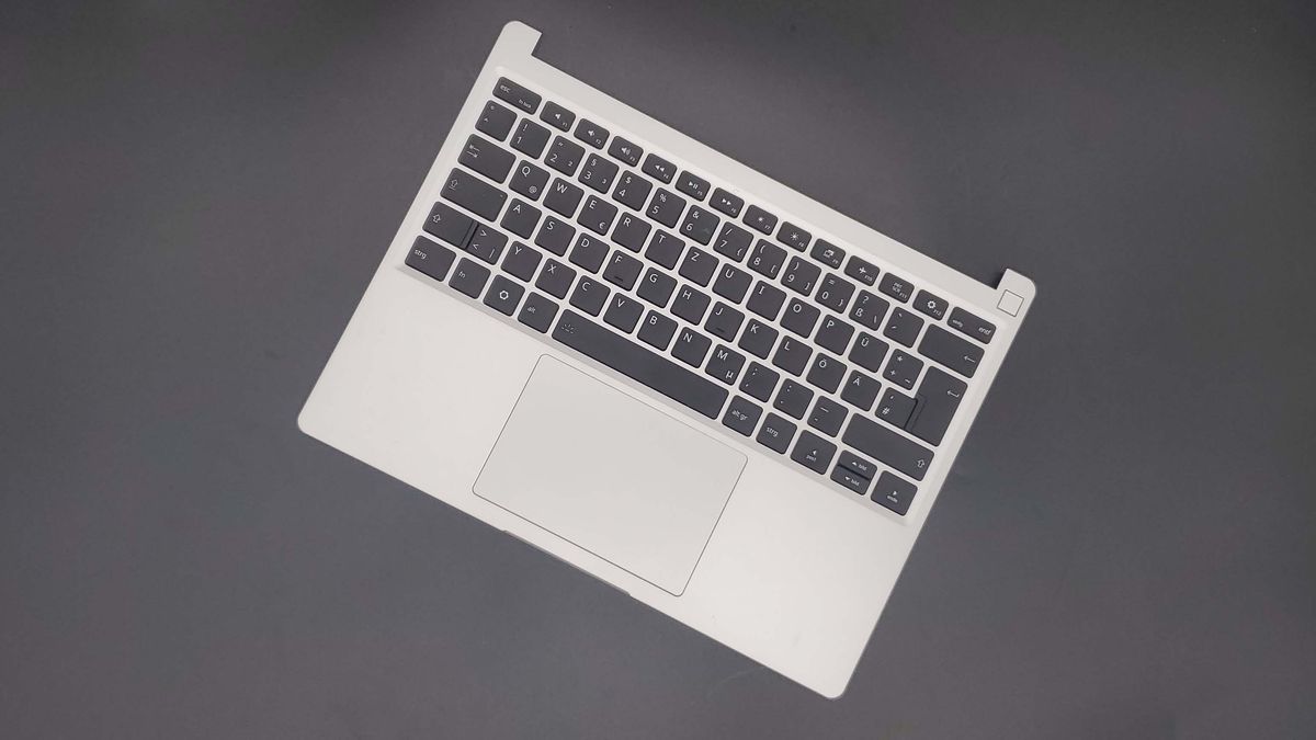 Framework 13 laptop on a dark grey background