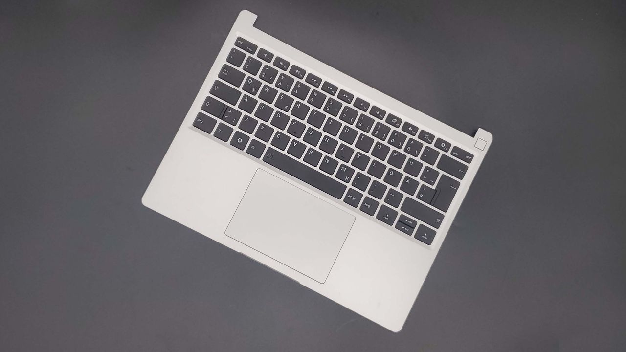 Framework 13 laptop on a dark grey background