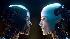 Two humanoid robots facing each other.