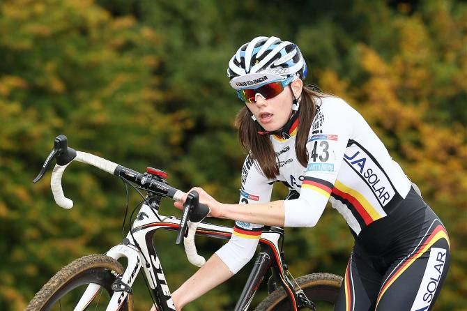 Jessica Lambracht prepares to re-mount her stead.