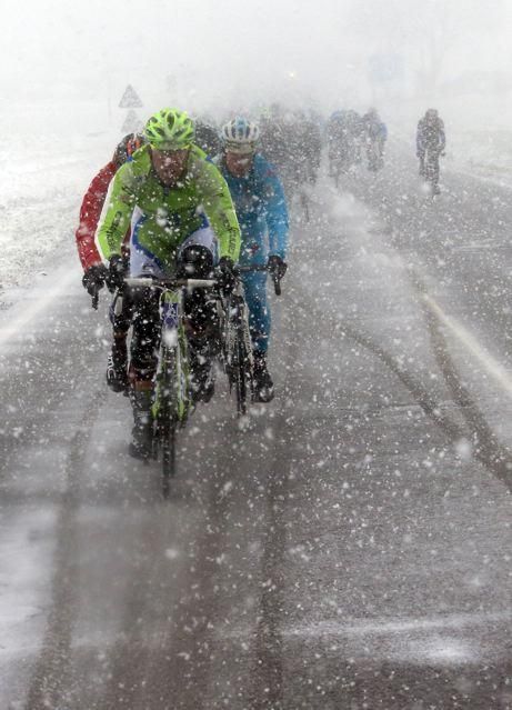 The snow covered the road and made it difficult for the riders to see