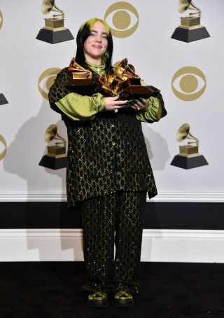 LOS ANGELES, CALIFORNIA - JANUARY 26: Billie Eilish, winner of Record of the Year for "Bad Guy", Album of the Year for "when we all fall asleep, where do we go?", Song of the Year for "Bad Guy", Best New Artist and Best Pop Vocal Album for "when we all fall asleep, where do we go?", poses in the press room during the 62nd Annual GRAMMY Awards at STAPLES Center on January 26, 2020 in Los Angeles, California.
