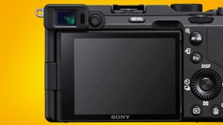 The back of the Sony A7C camera on a yellow background