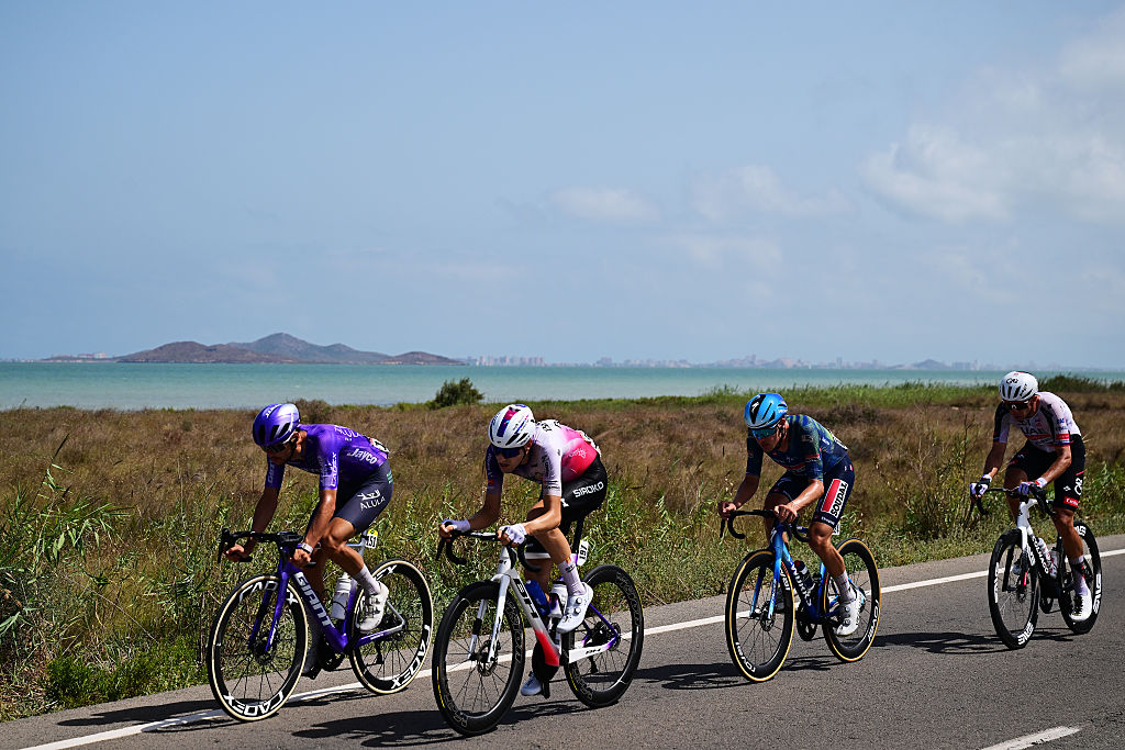 Alessandro Covi of Jayco AlUla, Sinuhe Fernandez of Burgos Burpellet BH, Ethan Hayter of Soudal Quick-Step and Domen Novak of UAE Team Emirates XRG compete in the breakaway