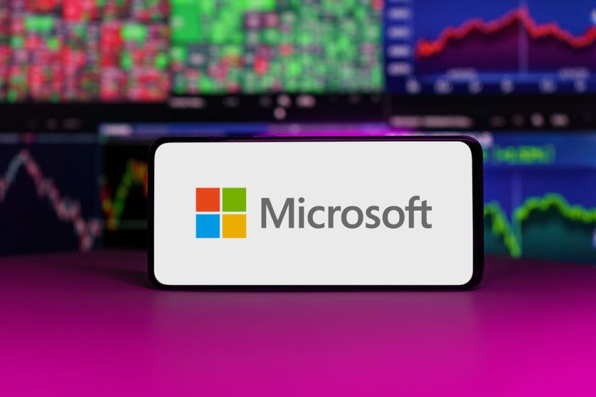 Microsoft logo on mobile phone screen company shares rise or fall on stock exchange market