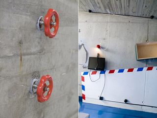 Stokkoya Resort by Svenning and Langklopp, Norway. Two images. Left, a concrete wall with red taps on it. Right, a concrete wall with a black screen on it and a blue floor in front of it.