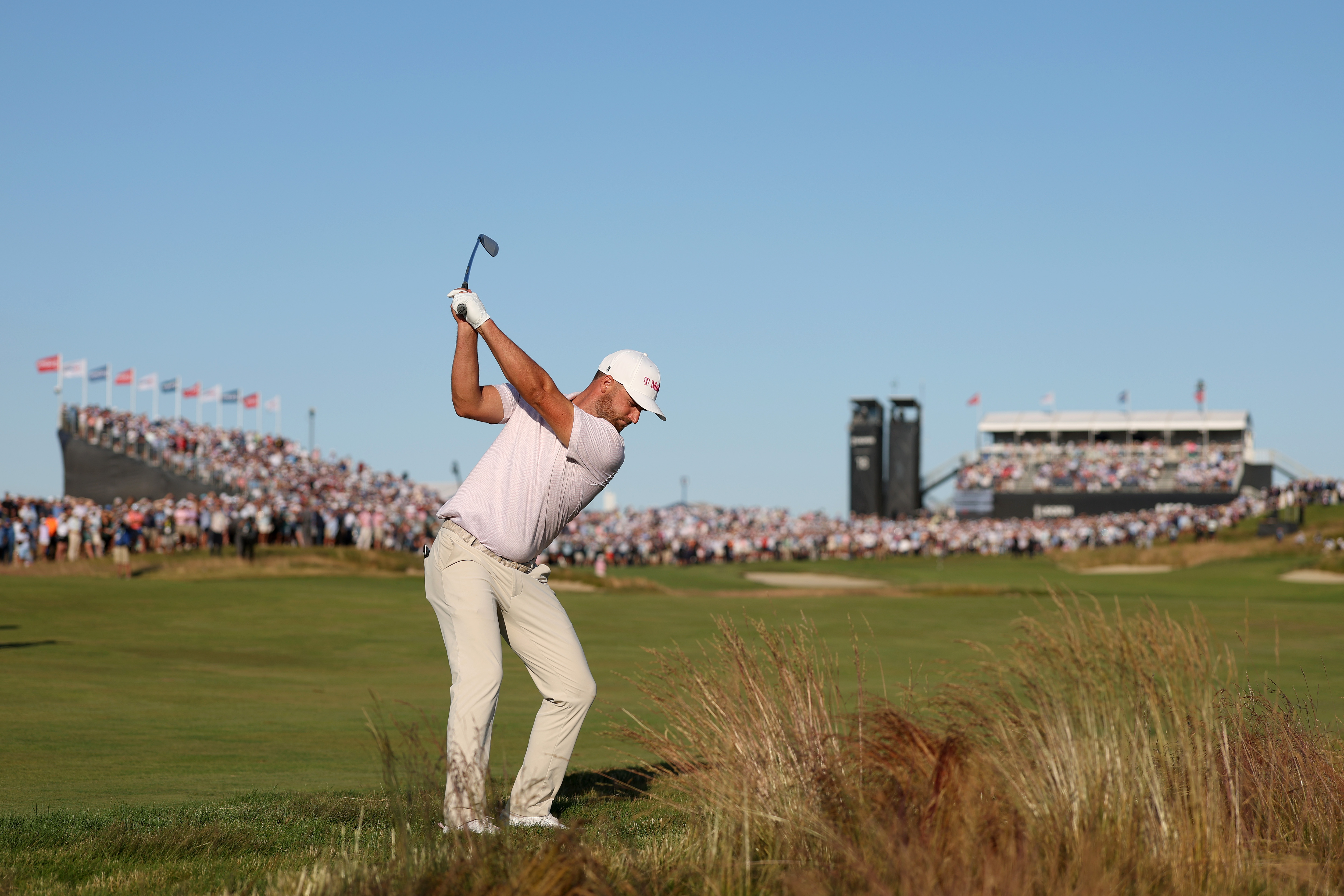 Wyndham Clark of the United States plays a shot on the 18th hole during the final round of the 126th U.S. OPEN at Shinnecock Hills Golf Club(Photo by Christian Petersen/Getty Images)