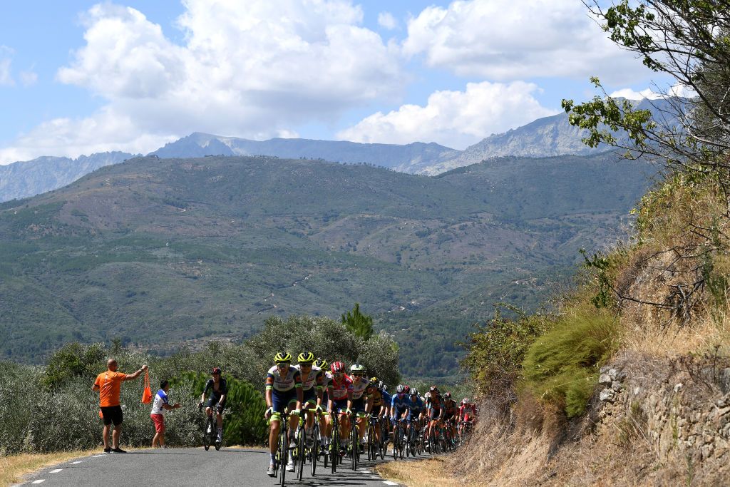 EL BARRACO SPAIN AUGUST 29 A general view of Kevin Van Melsen of Belgium Odd Christian Eiking of Norway and Team Intermarch Wanty Gobert Matriaux red leader jersey lead the peloton during the 76th Tour of Spain 2021 Stage 15 a 1975km km stage from Navalmoral de la Mata to El Barraco lavuelta LaVuelta21 on August 29 2021 in El Barraco Spain Photo by Tim de WaeleGetty Images