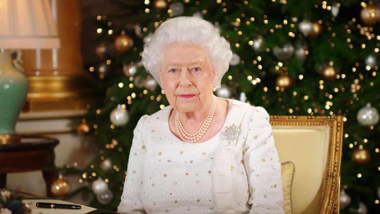 london, united kingdom in this undated image supplied by sky news, queen elizabeth ii sits at a desk in the 1844 room at buckingham palace, as she records her christmas day broadcast to the commonwealth at buckingham palace, london photo by sky news via getty images