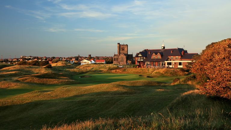 Wallasey Golf Club 18th green pictured with clubhouse and church beyond