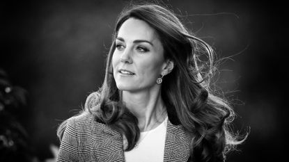 Kate Middleton with the wind in her hair in black and white