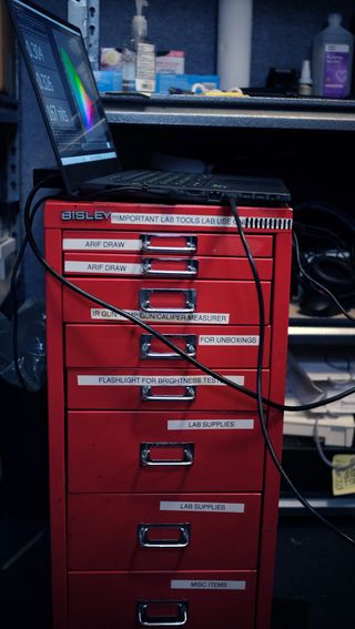 red tool cabinet for laptop testing devices