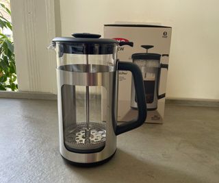 OXO French Press in front of box on countertop