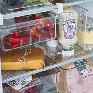 Fridge filled with food in fridge organisers