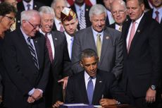 Obama signs the Veterans Choice Act