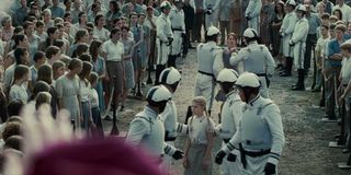 Katniss Everdeen makes a fateful decision during the "reaping" that chooses one girl and one boy from each of 12 districts to fight to the death in "The Hunger Games."