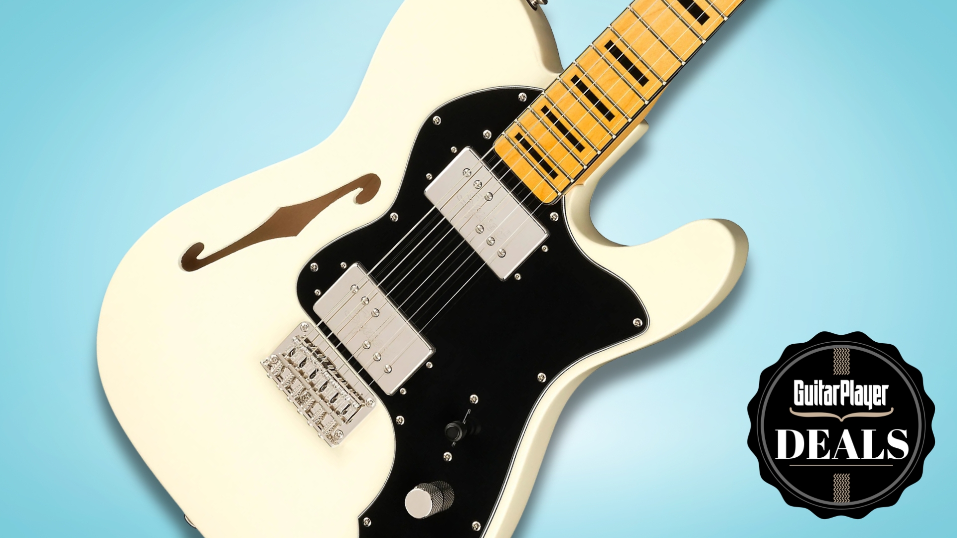 A Squier Classic Vibe &#039;70s Telecaster Thinline electric guitar on a blue background