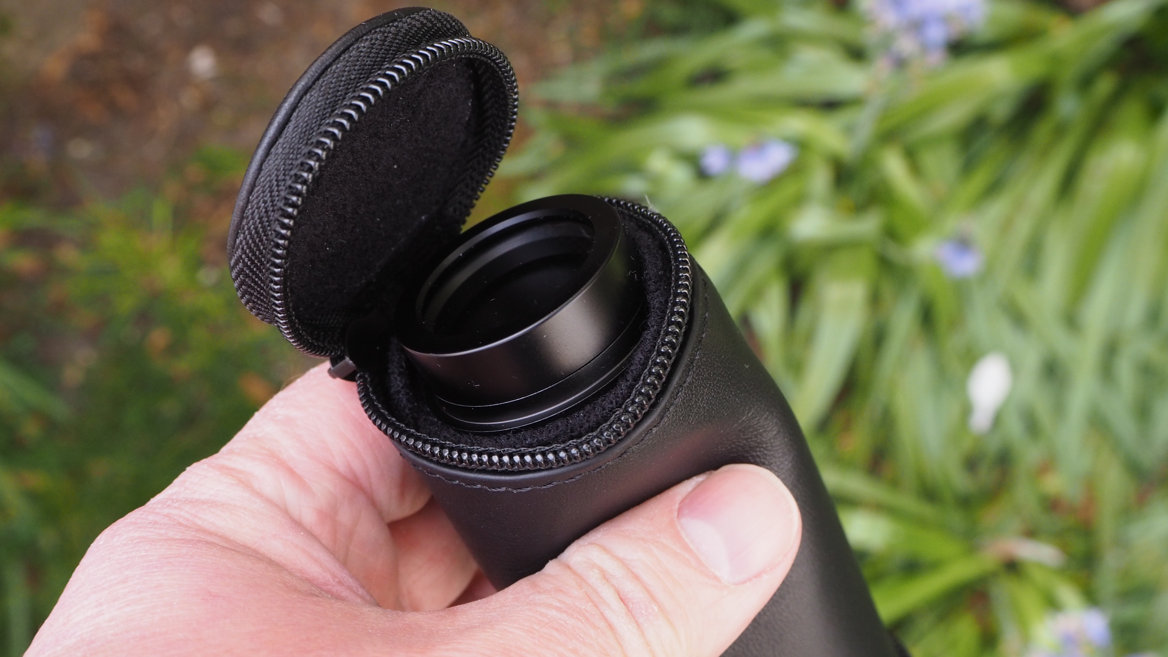 Leica Monovid 8x25 monocular held in someone's hand