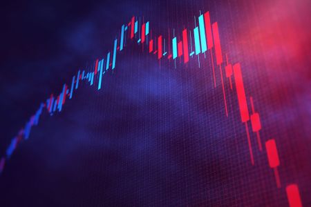 closeup of stock chart with red and green bars indicating selloff