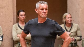 Billy looks at the recruits.