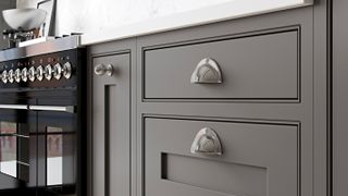 grey kitchen unit storage drawers with chrome cup handles