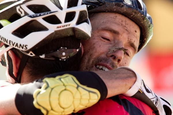 David George embraces teammate Kevin Evans of Team 360Life after they won stage 6