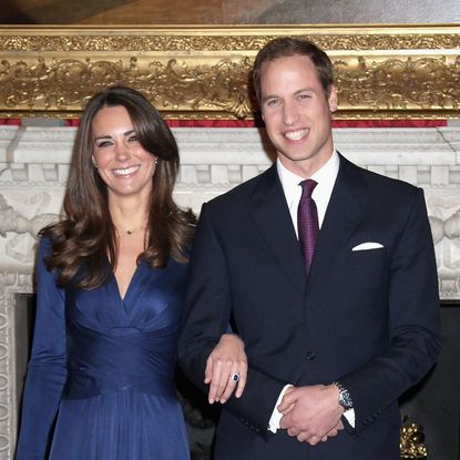 Prince William and Kate Middleton pose for photographs after the news of their engagement in 2010