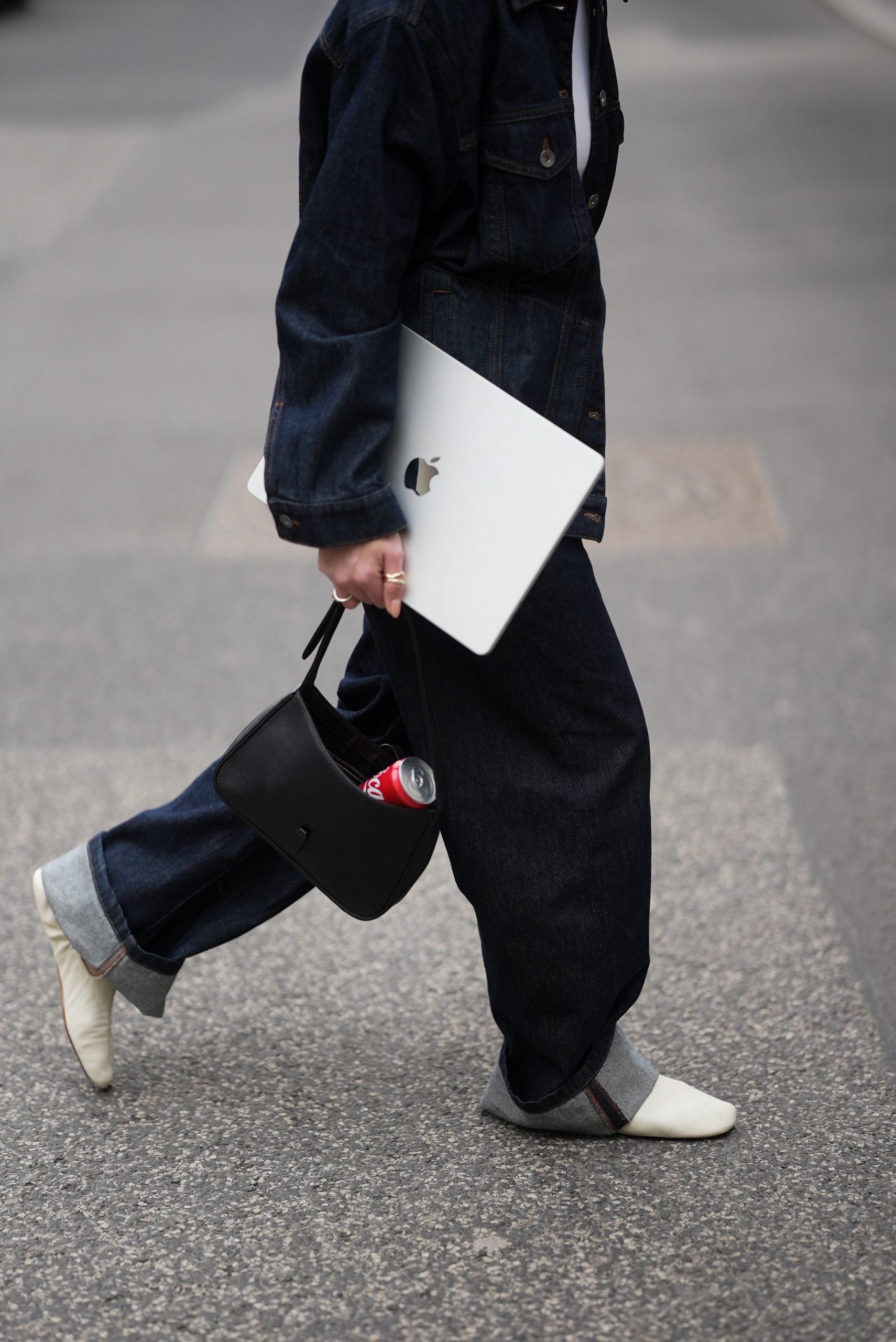 Woman walking away, representing the decision to leave a job or workplace that no longer serves her.