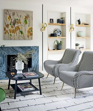 White living room by Kitesgrove with alcoves and Houndstooth Boucle armchairs