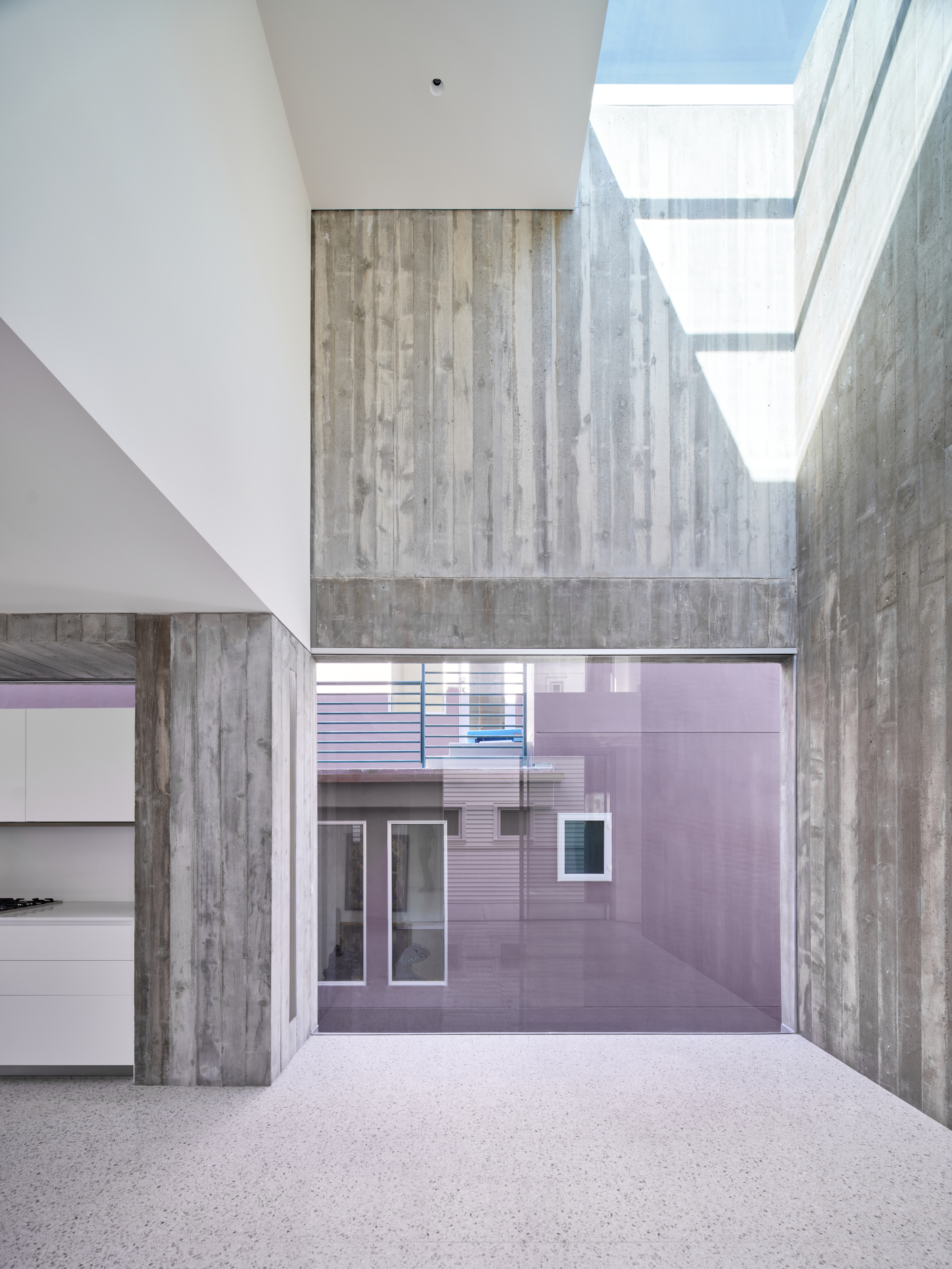 Venice Beach house by Dan Brunn, showing concert double height interior living space with light well