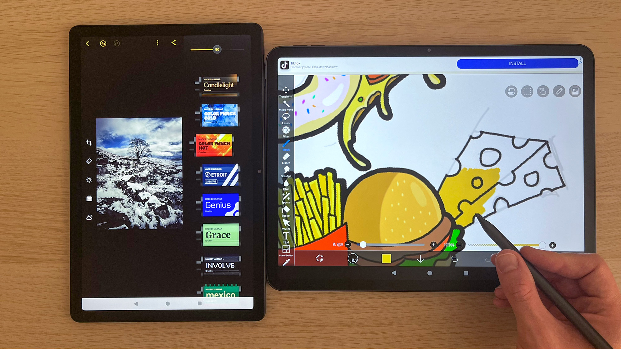 Huion Kamvas Slate 11 (left) displaying Luminar: Photo Editor and Huion Kamvas Slate 13 (right) displaying drawing on ibisPaint X