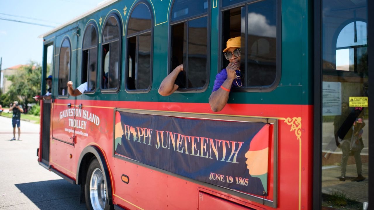 A parade float drives by during the 45th annual Juneteenth National Independence Day celebrations in Galveston, Texas