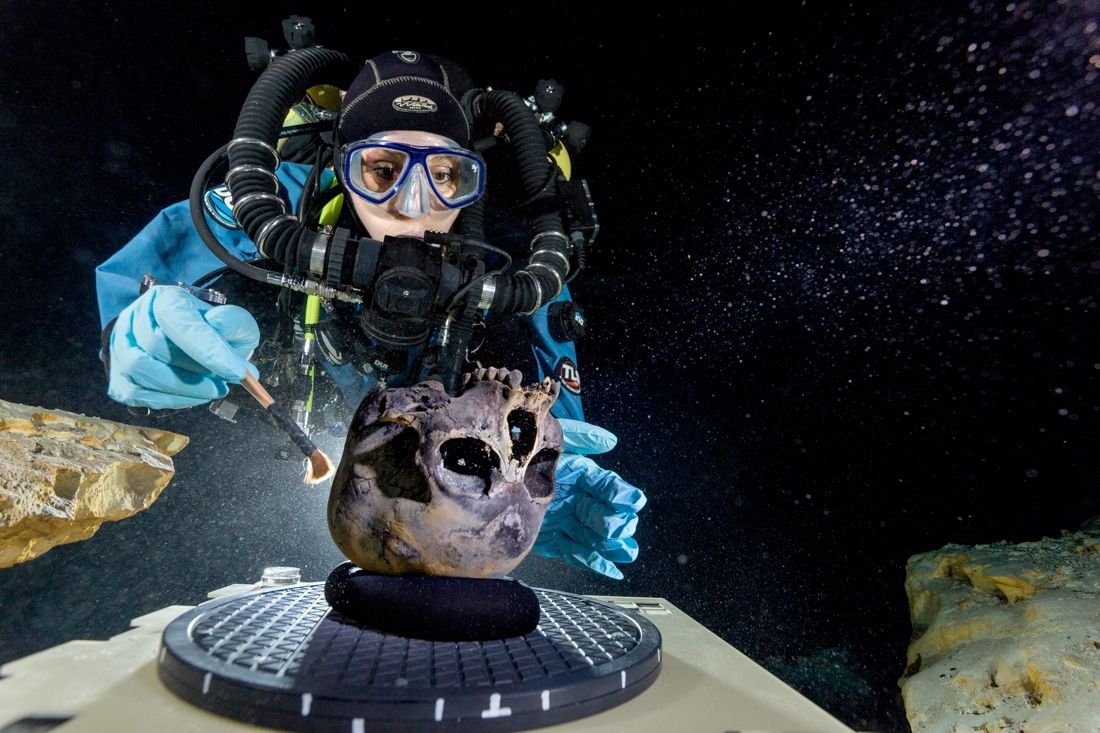 Diver Susan Bird working at the bottom of Hoyo Negro, a large dome-shaped underwater cave on Mexico&#039;s Yucatan Peninsula.