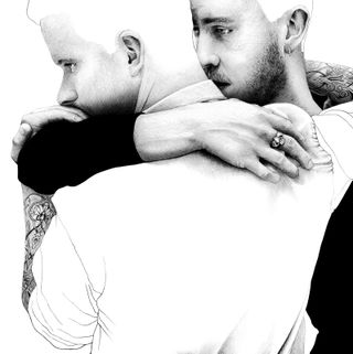 image of two men hugging