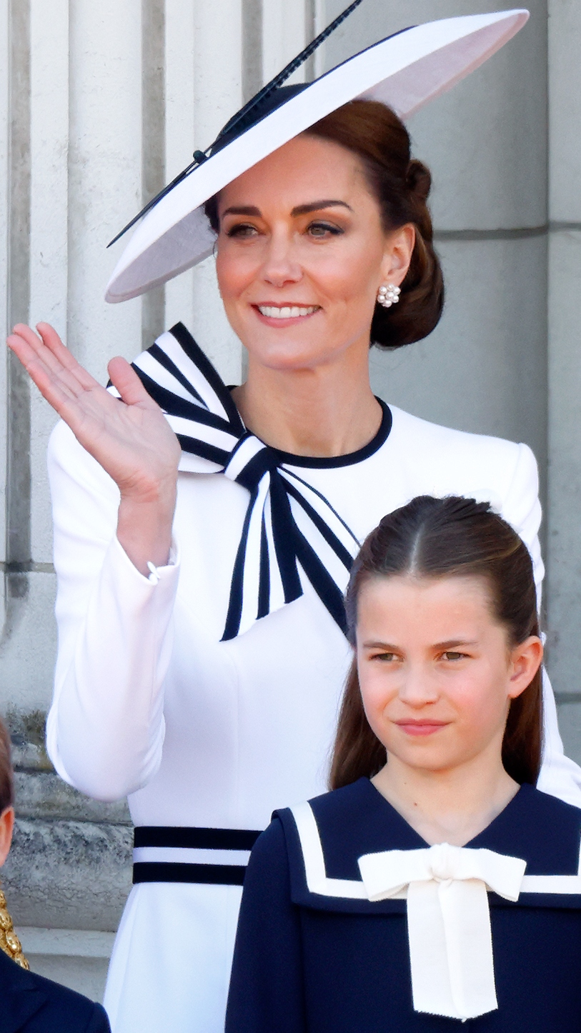 Catherine, Princess of Wales and Princess Charlotte of Wales watch an RAF flypast from the balcony of Buckingham Palace after attending Trooping the Colour on June 15, 2024