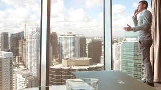 Businessman by window